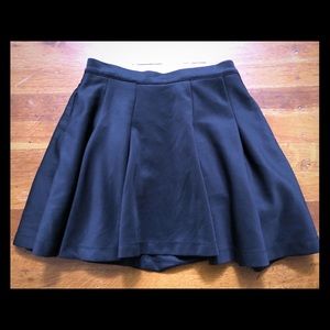 SOLD - Glamorous black A-line pleated skirt